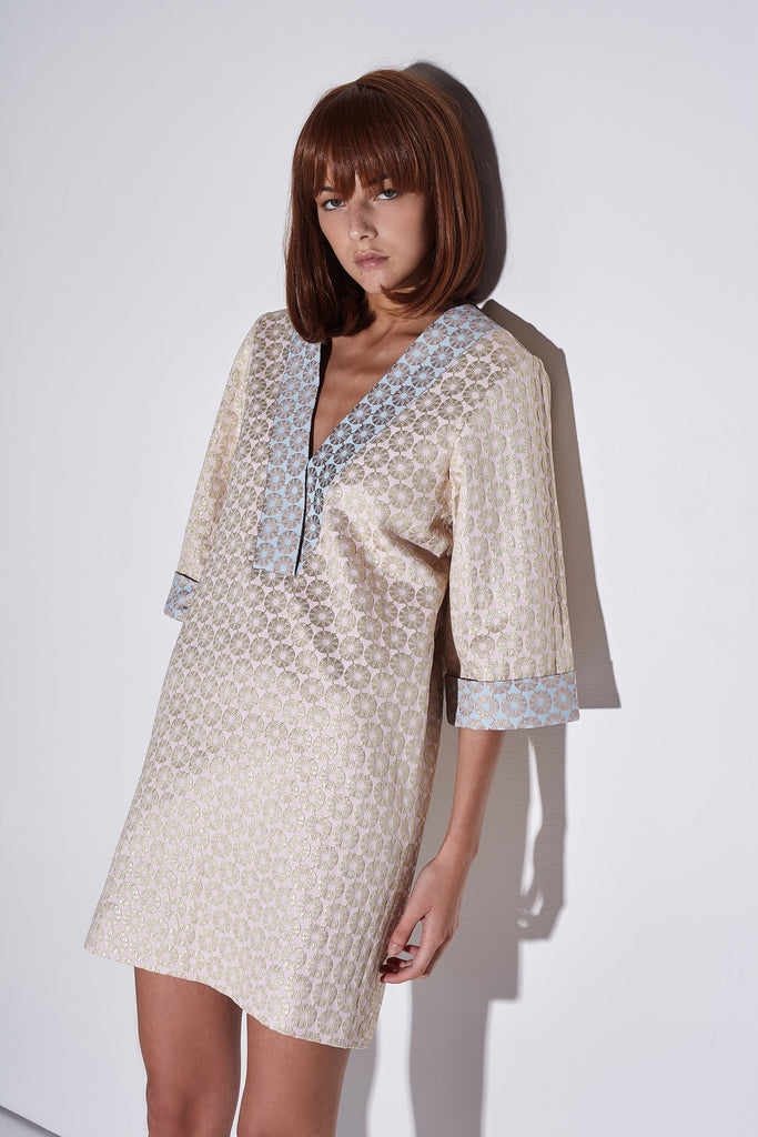 Linen Ripple Comb Mini dress. It has a V neckline and mid length sleeves. – KAGE